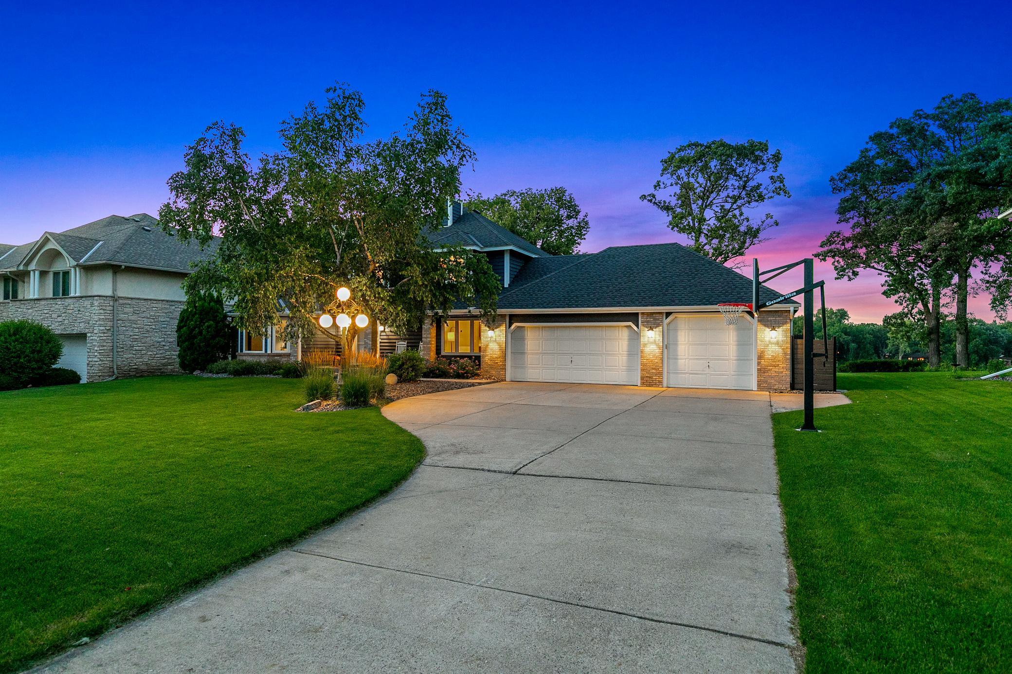 The long, flat, extra wide driveway provides plenty of space for outdoor activities and/or for guest parking.