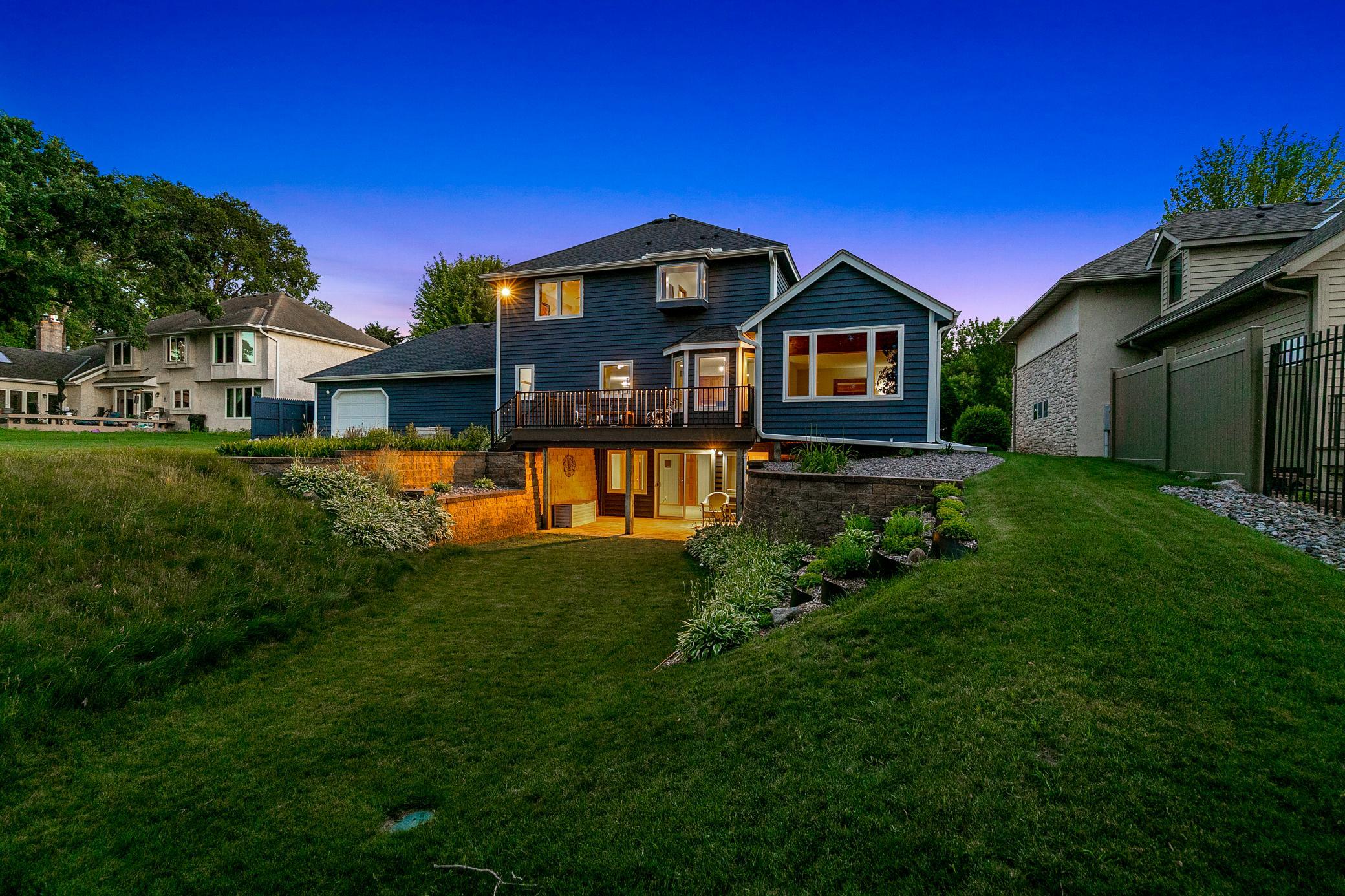 A covered paver patio is located just through the sliding glass door which is great for watching storms roll in over the river bluff.