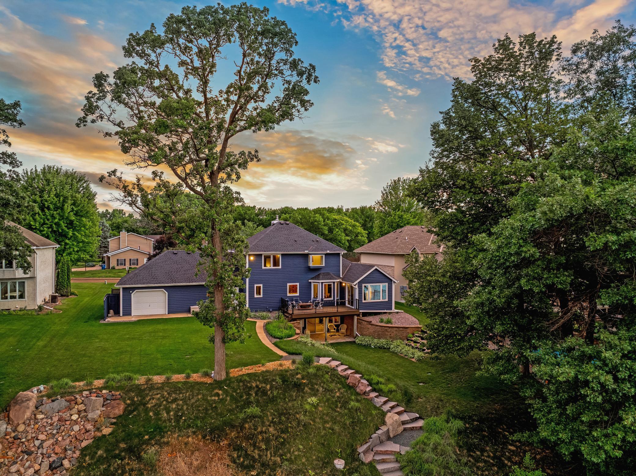 The shoreline renovation project features granite rip rap, granite stairs, an aluminum stair and platform system, poured footings for dynamic anchoring, and a maintenance free dock system.