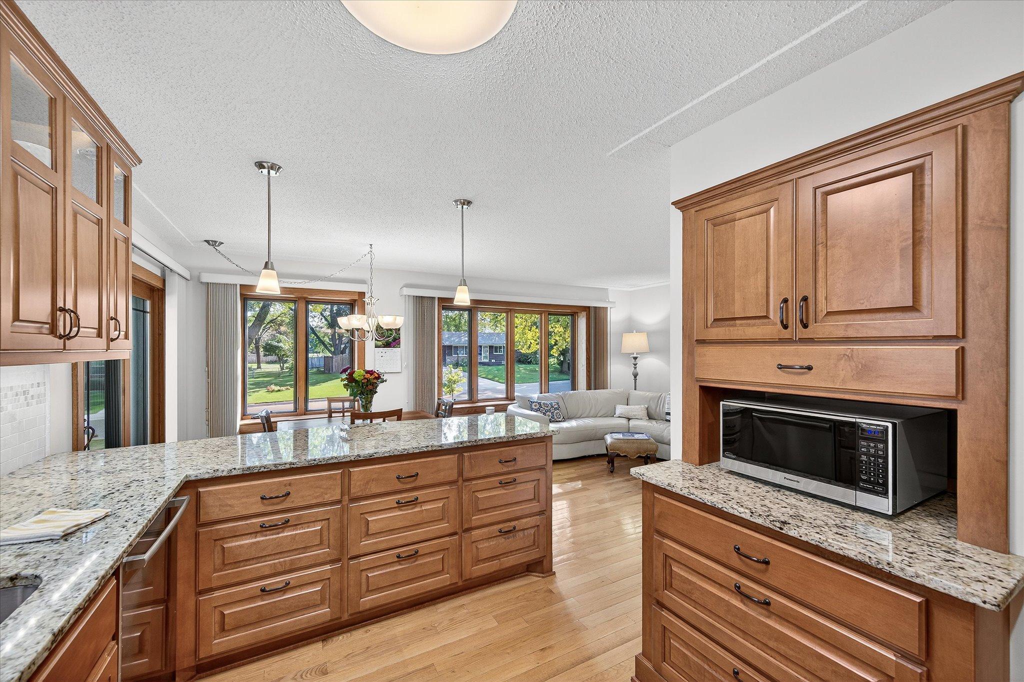 Granite countertops, ample lighting options, updated appliances.