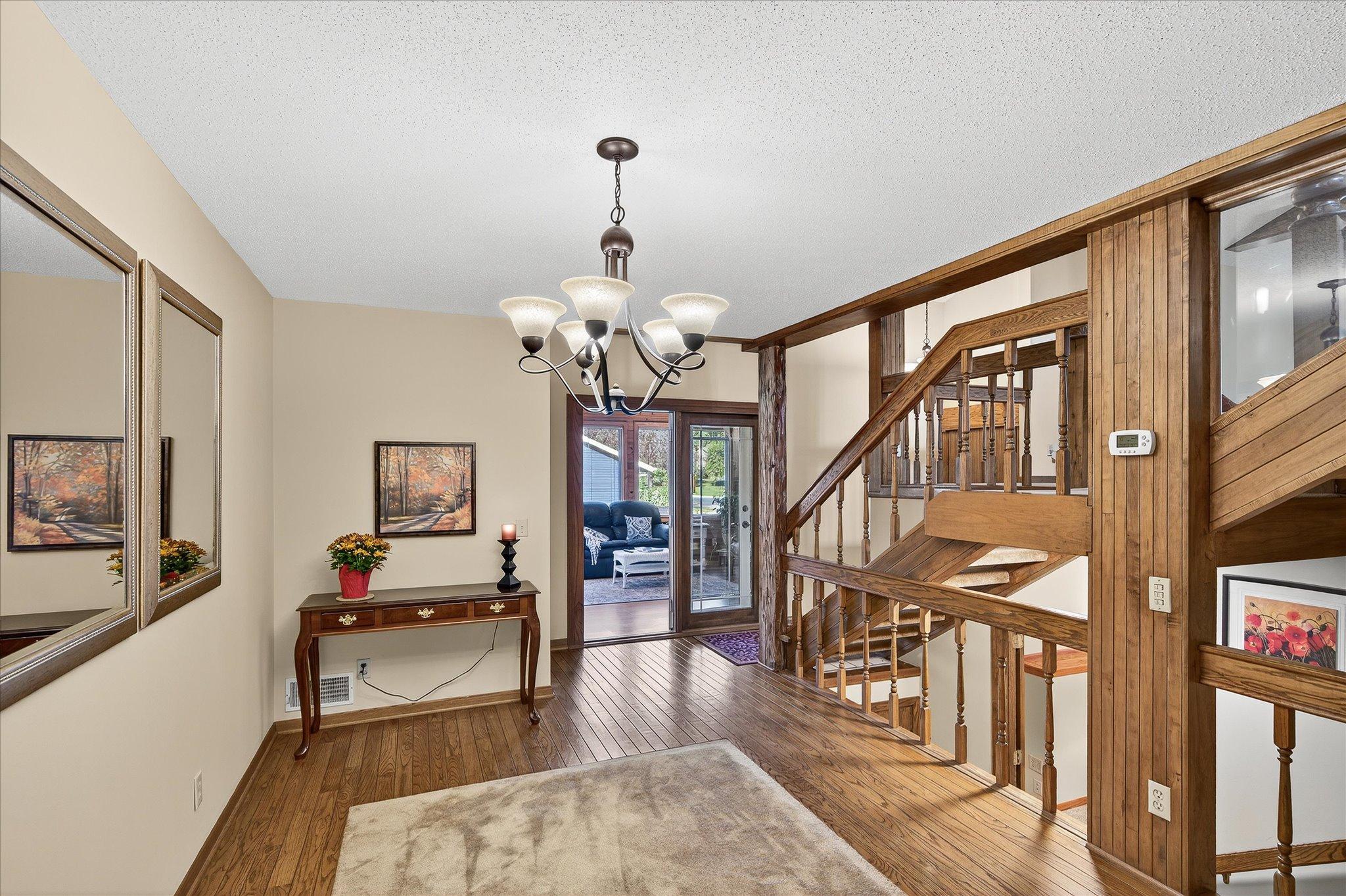 Formal dining room with carpet inlay.