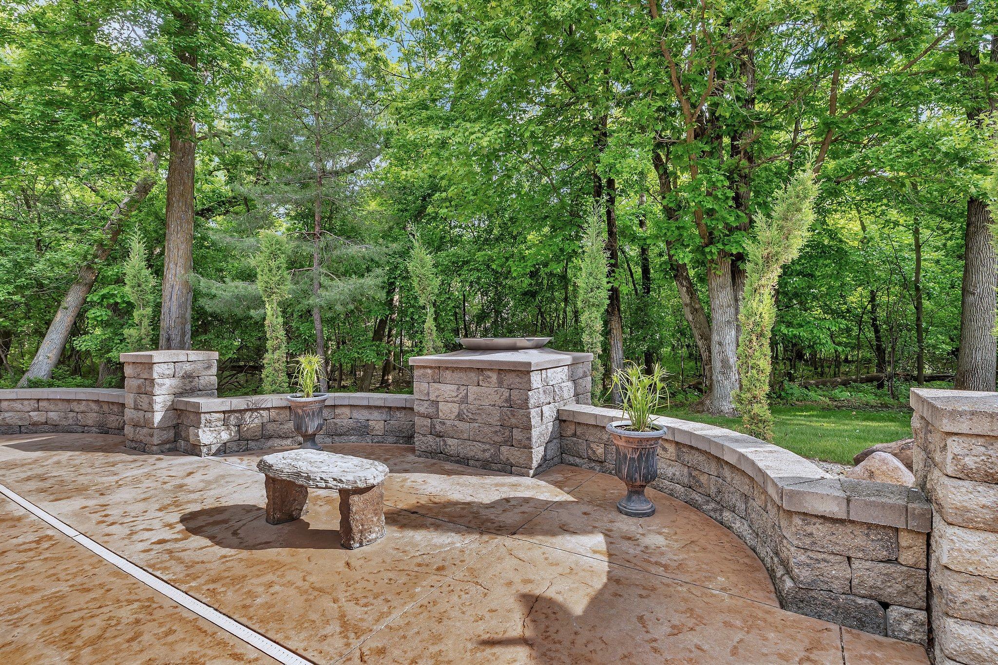 Beautiful stamped concrete and block walls.