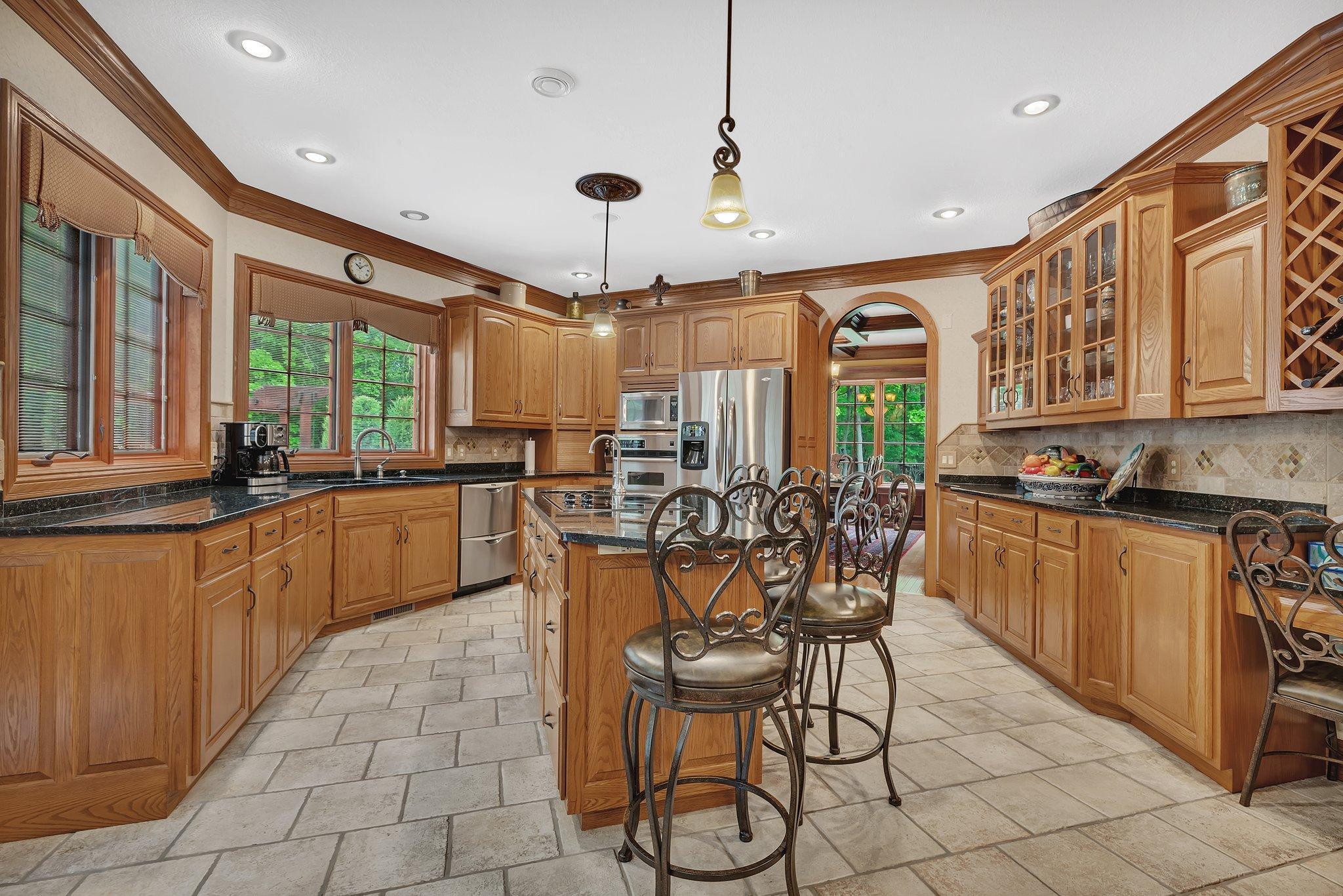 Spacious kitchen with granite throughout