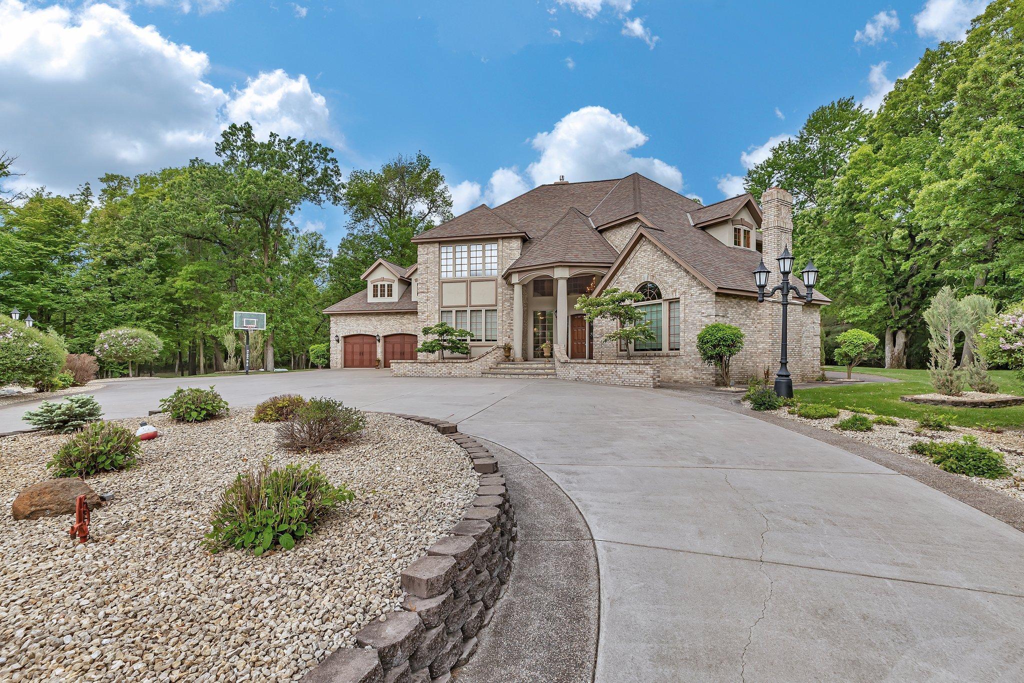All concrete drive with exposed aggregate accents
