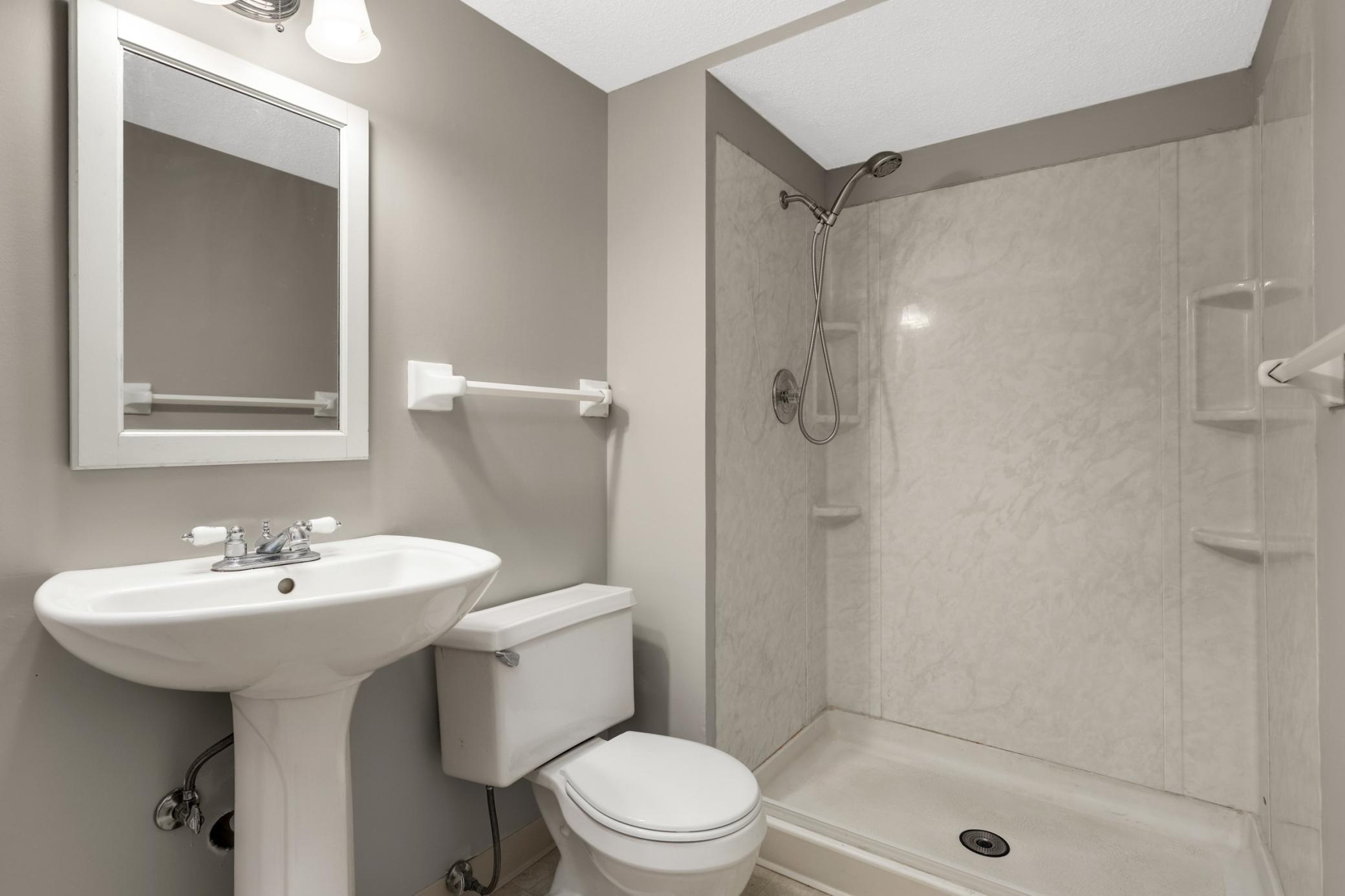 Three quarter bath located in the lower level.