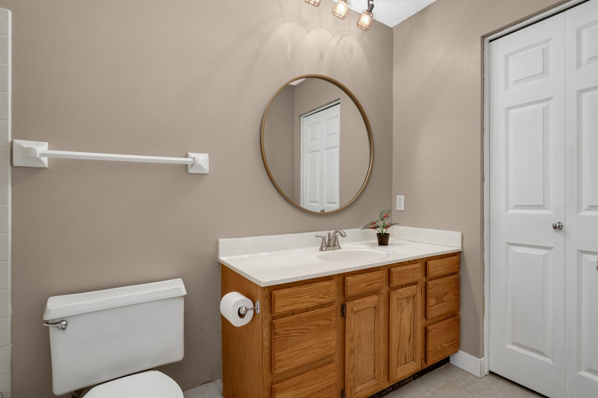 Upper level full bathroom with linen closet (tub/shower combination).