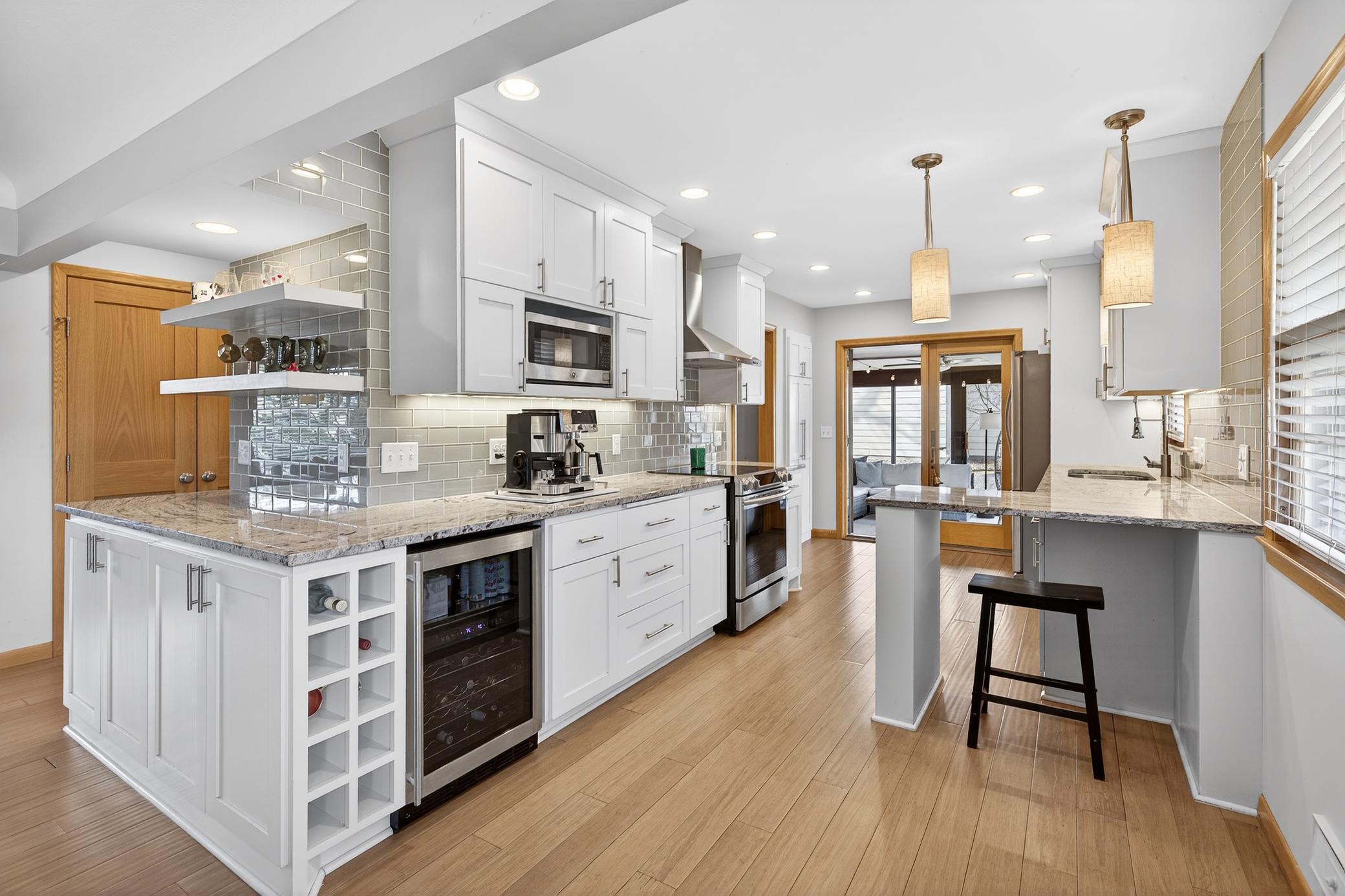 Fabulous open kitchen with wine fridge...