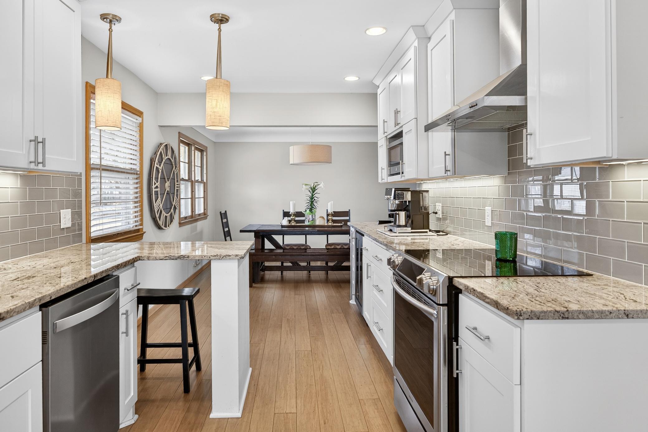 Breakfast bar & open to dining room...
