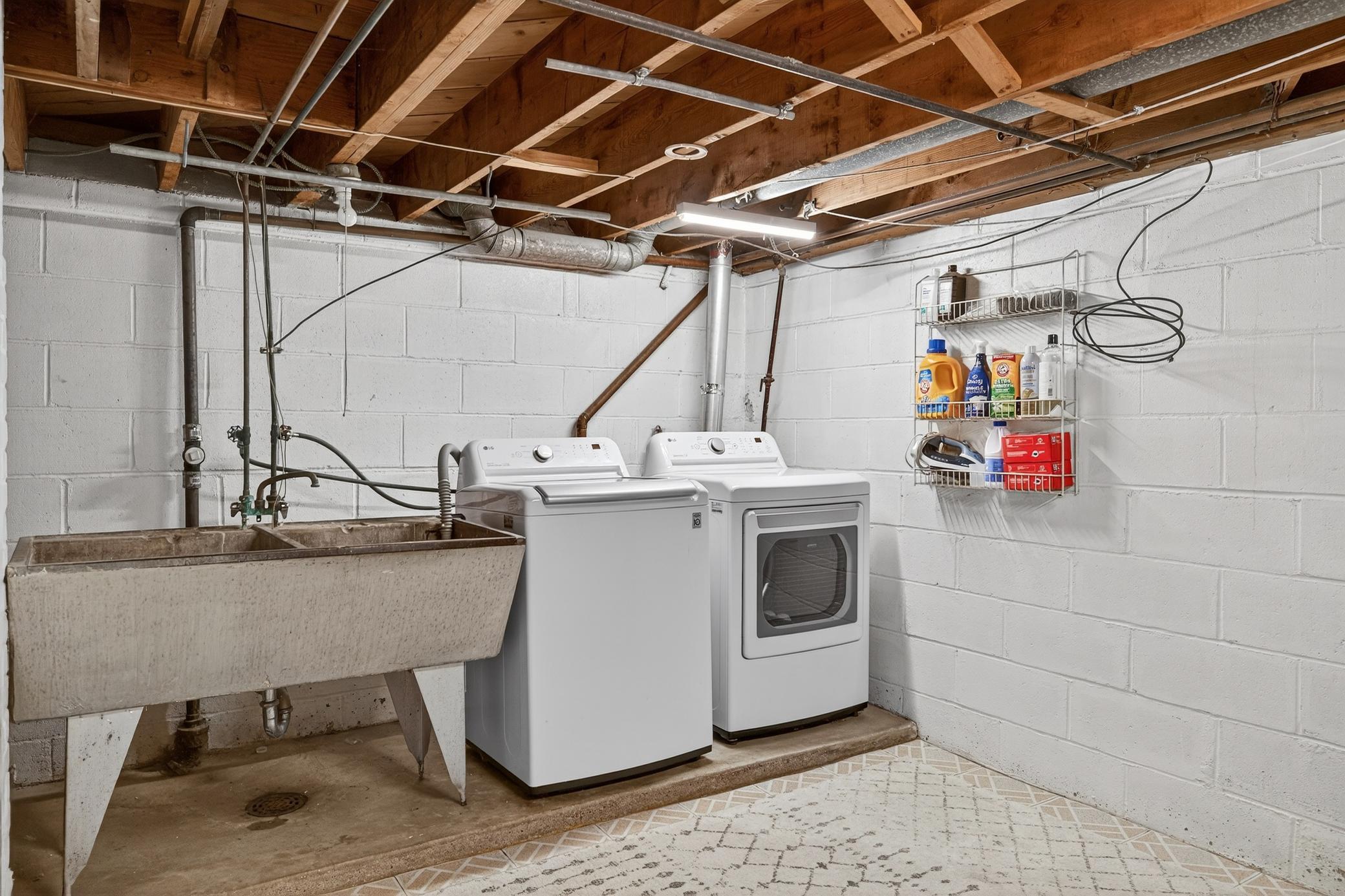 Good sized laundry area with extra storage as well...