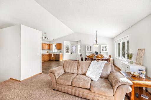 Inside, vaulted ceilings and open living spaces will instantly make you feel at home. The owners removed a wall between kitchen and living room in 2015 making it the inviting living area you see today.