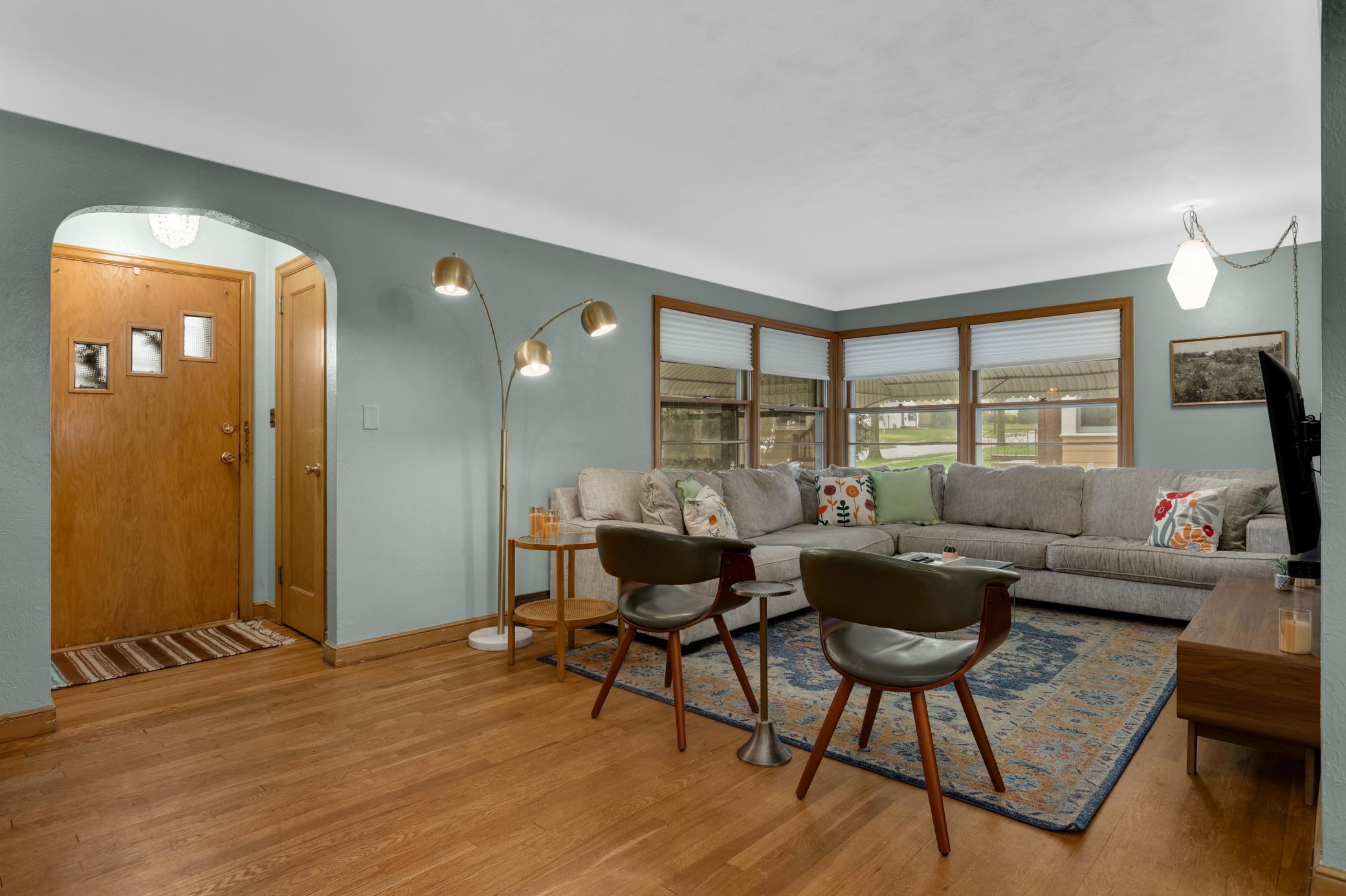 Corner windows let in the light in this oversized main floor living room.
