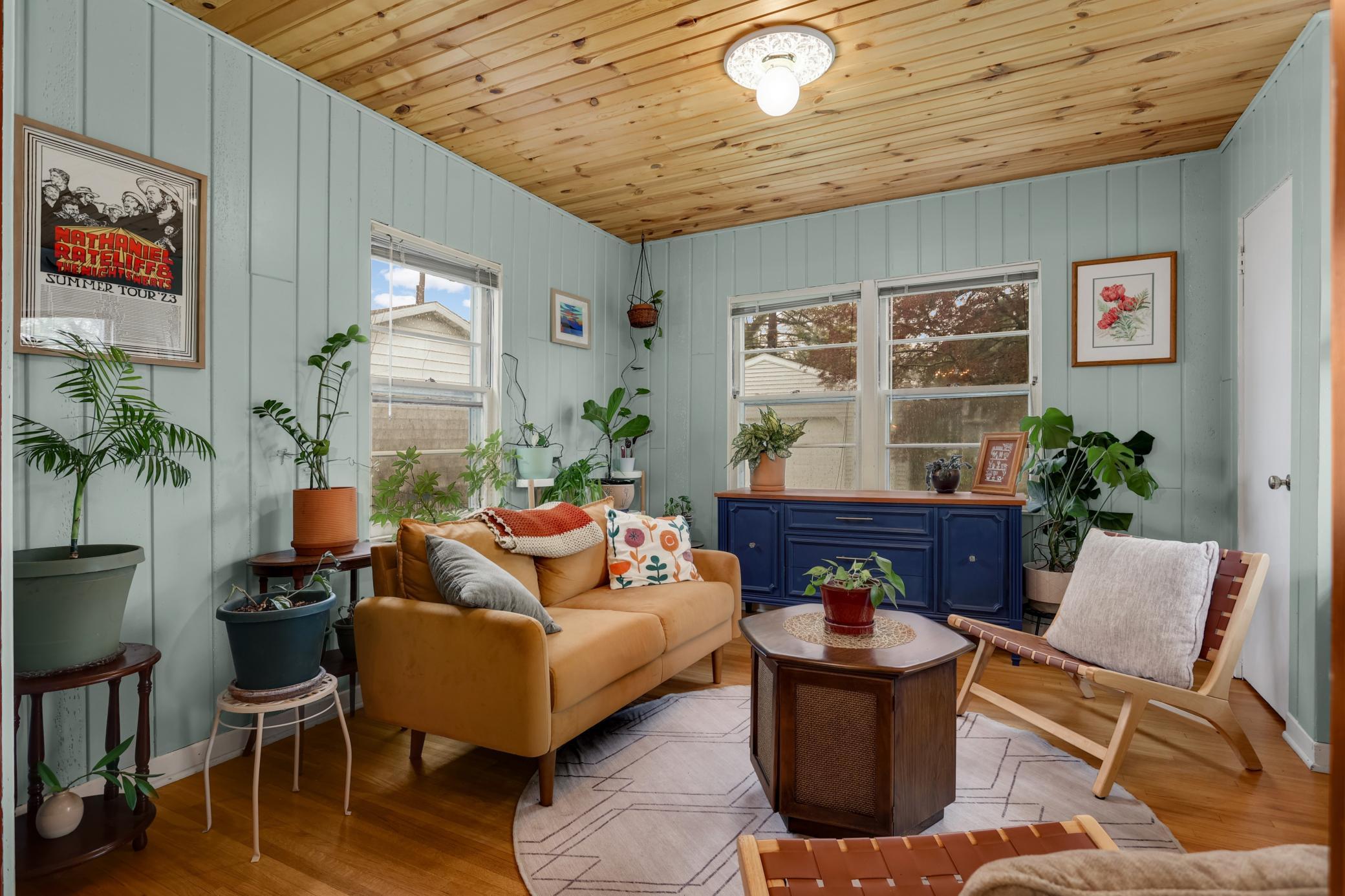 Lovely sunroom off the dining room at the back of the home.
