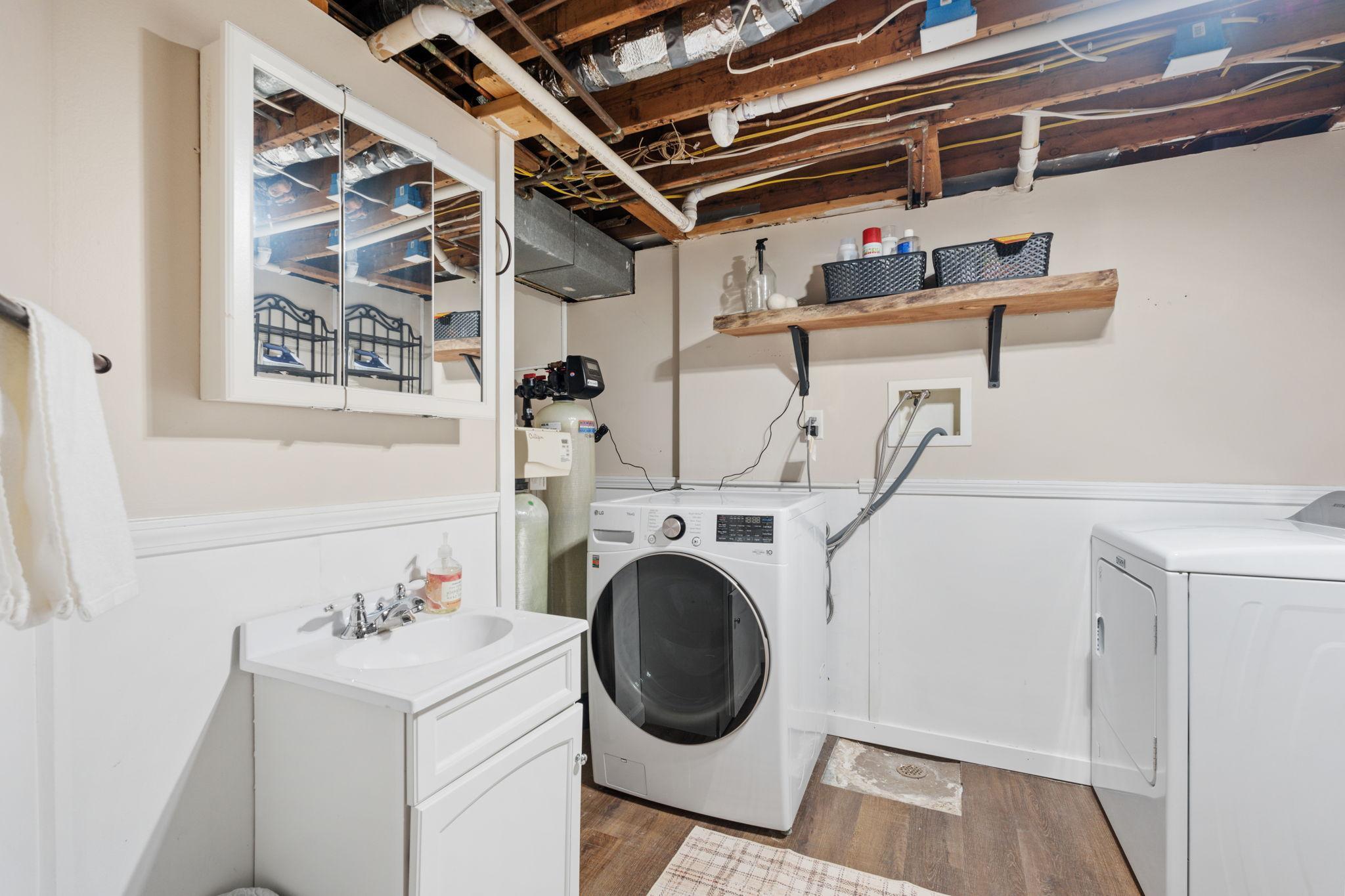 lower level Laundry Room and 1/2 Bathroom