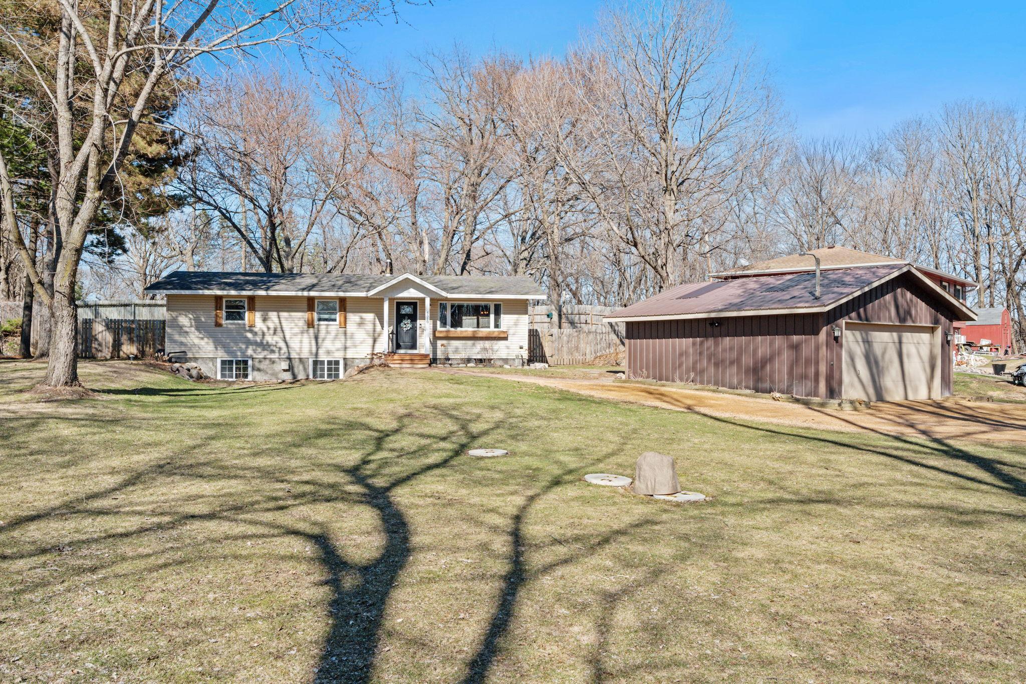 large front yard set back from the road