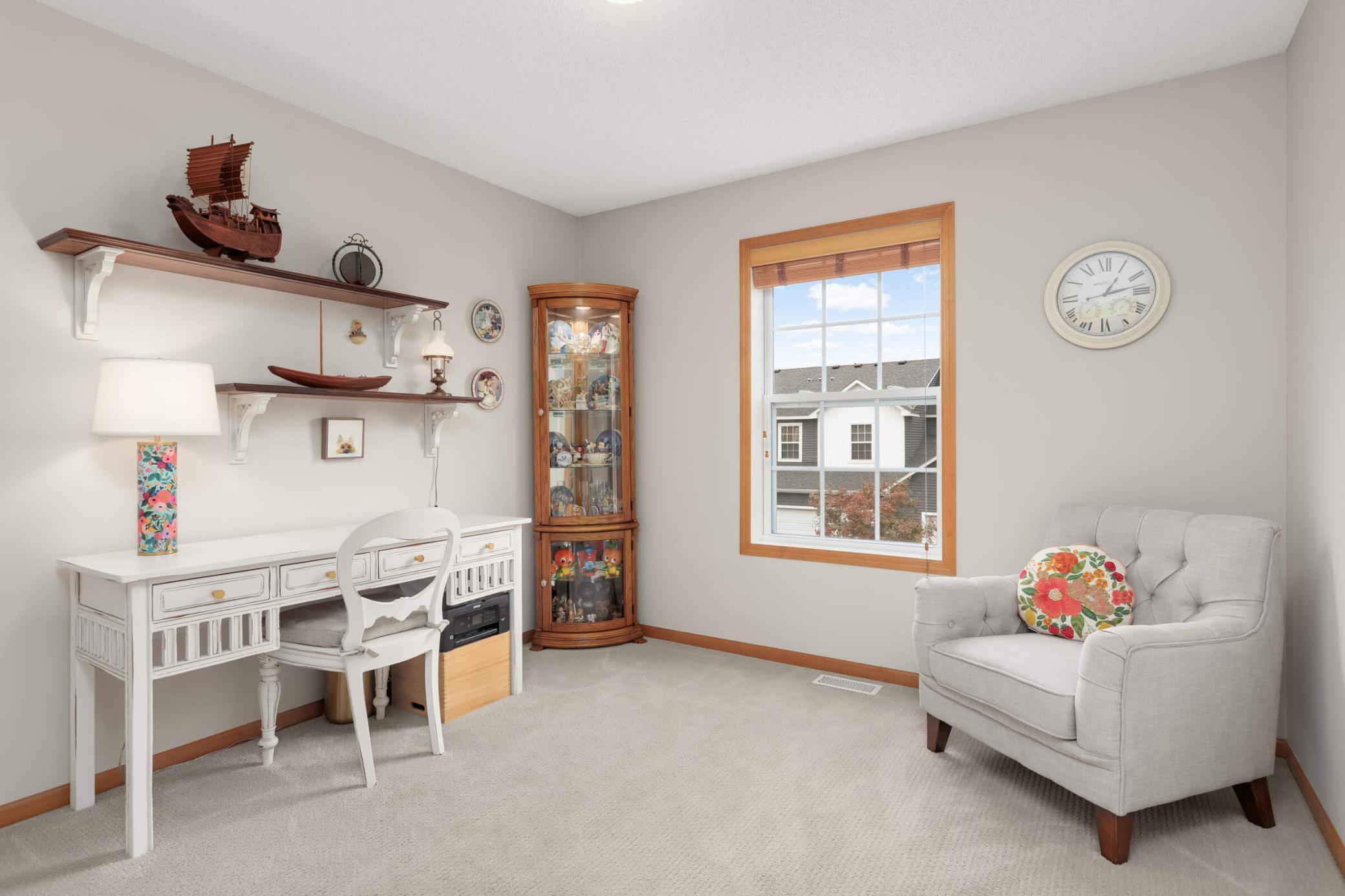 2nd upper level bedroom with a closet. This home offers nice window treatments throughout.