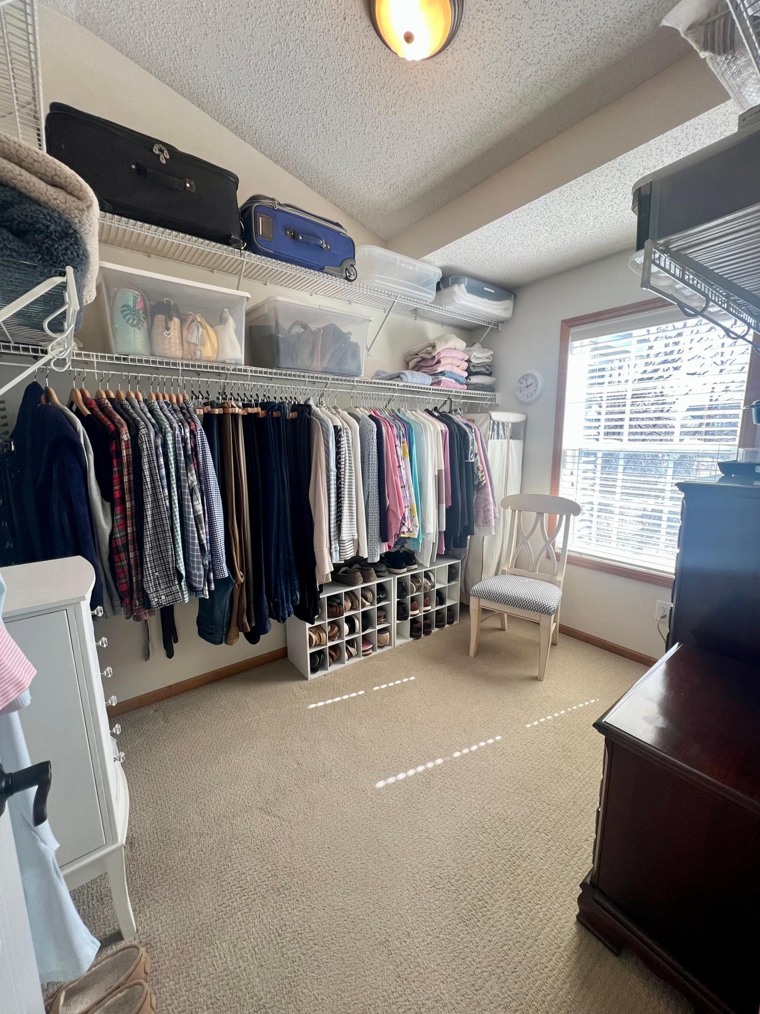 Spacious primary bedroom walk-in closet.