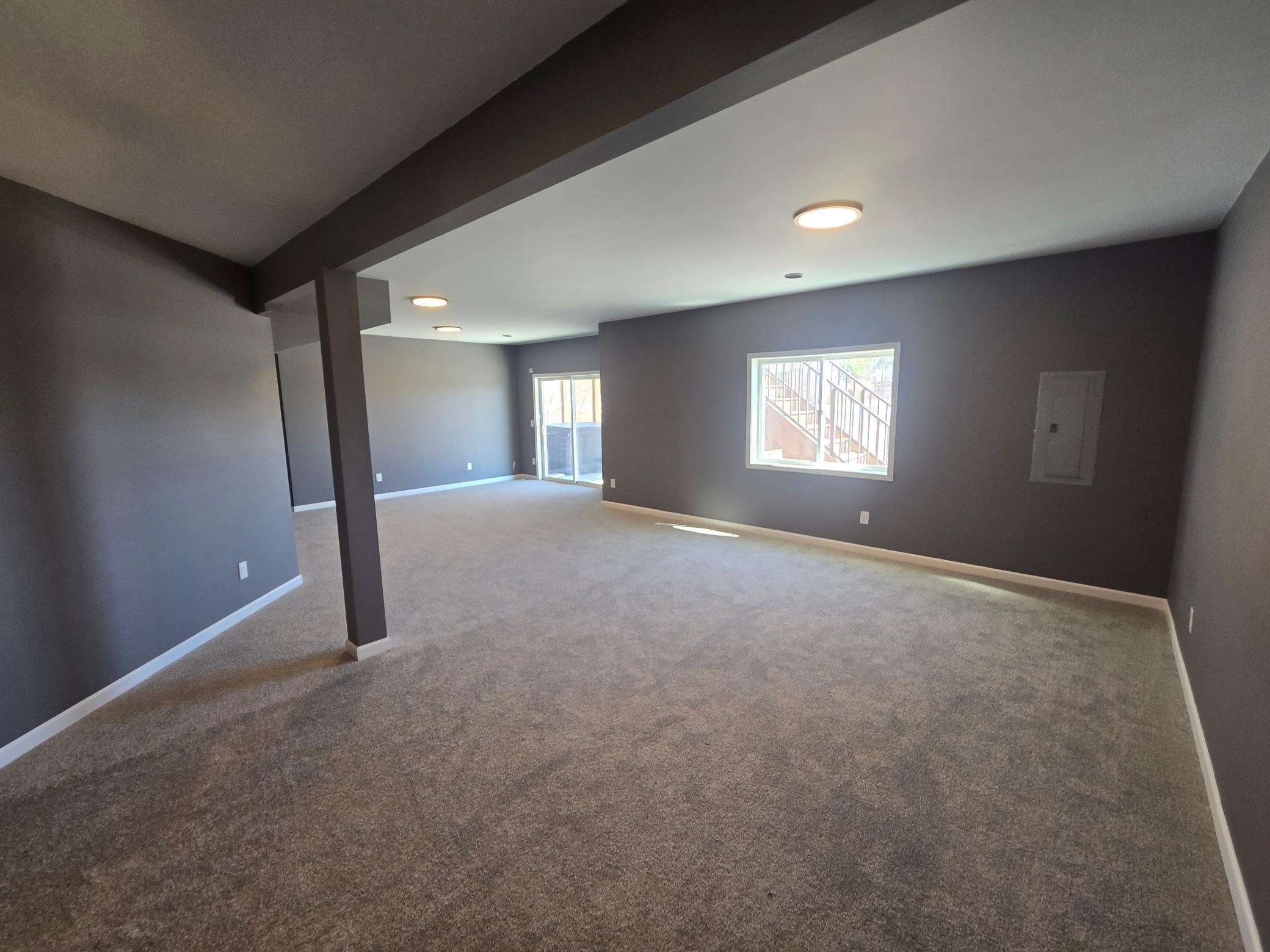 Here we have A view of the reiciently finished off lower level Family Room. This room is very bright and measures approximately @ 30' x 24.5.'
