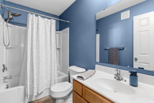 The two secondary bedrooms are served by a full bath