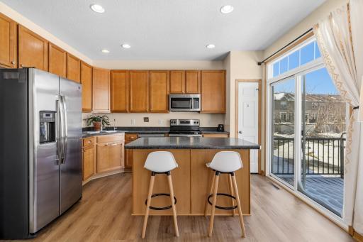 Sliding glass doors that even have a transom window--can you get any more natural light in a home??