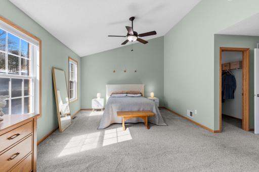 The primary has a walk-in closet and private, full bath with dual vanity.