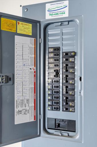 The electrical panel is housed within the garage.