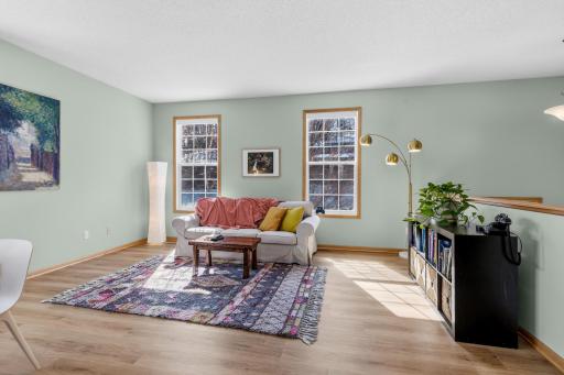 The living room windows overlook the private retaining wall. When the trees are fully leafed out, it's like living in a tree house.