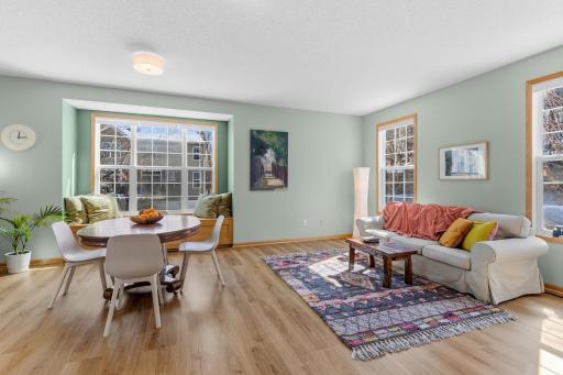 The over-sized living and dining areas are flooded with natural light.