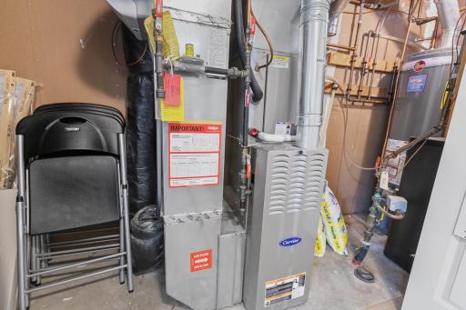 The mechanical closet houses the furnace, water heater, water softener, and reverse osmosis system. And there's still some room for storage.