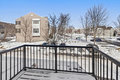 Many of the balconies of this townhome style actually look out at the neighbors' balconies. Yours has a view back toward the main road and out over the association. So much more scope for the imagination. :)