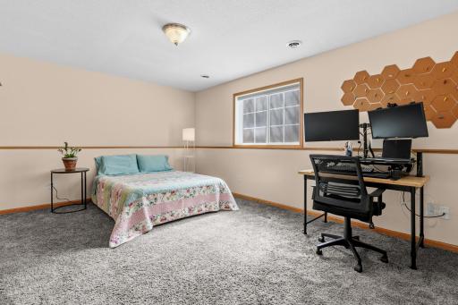 The home's lower level houses a fourth bedroom with a private bath.