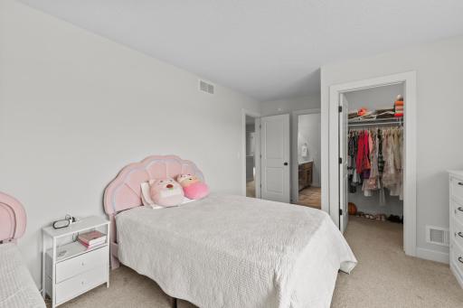 The walk in closets offer ample space for your families belongings.