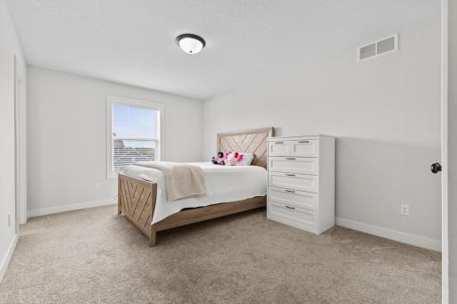 Fourth bedroom on upper level with private 3/4 bathroom.