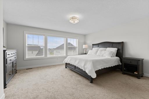 Generously sized primary bedroom & ensuite.