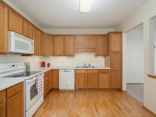 Large kitchen with plenty of room for a small table in addition to the dining area.