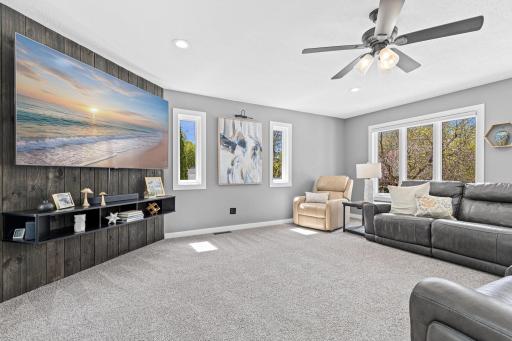 Plush new carpet, abundant natural light, and a layout that works for everything from movie night to Sunday morning reading.