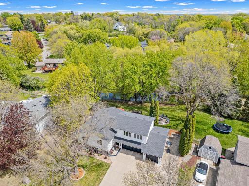 Tucked into an established neighborhood with a fenced in yard the lot and location is as great as the house.