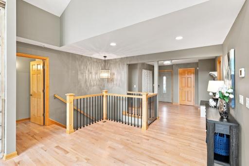 Primary suite entrance, basement and front door