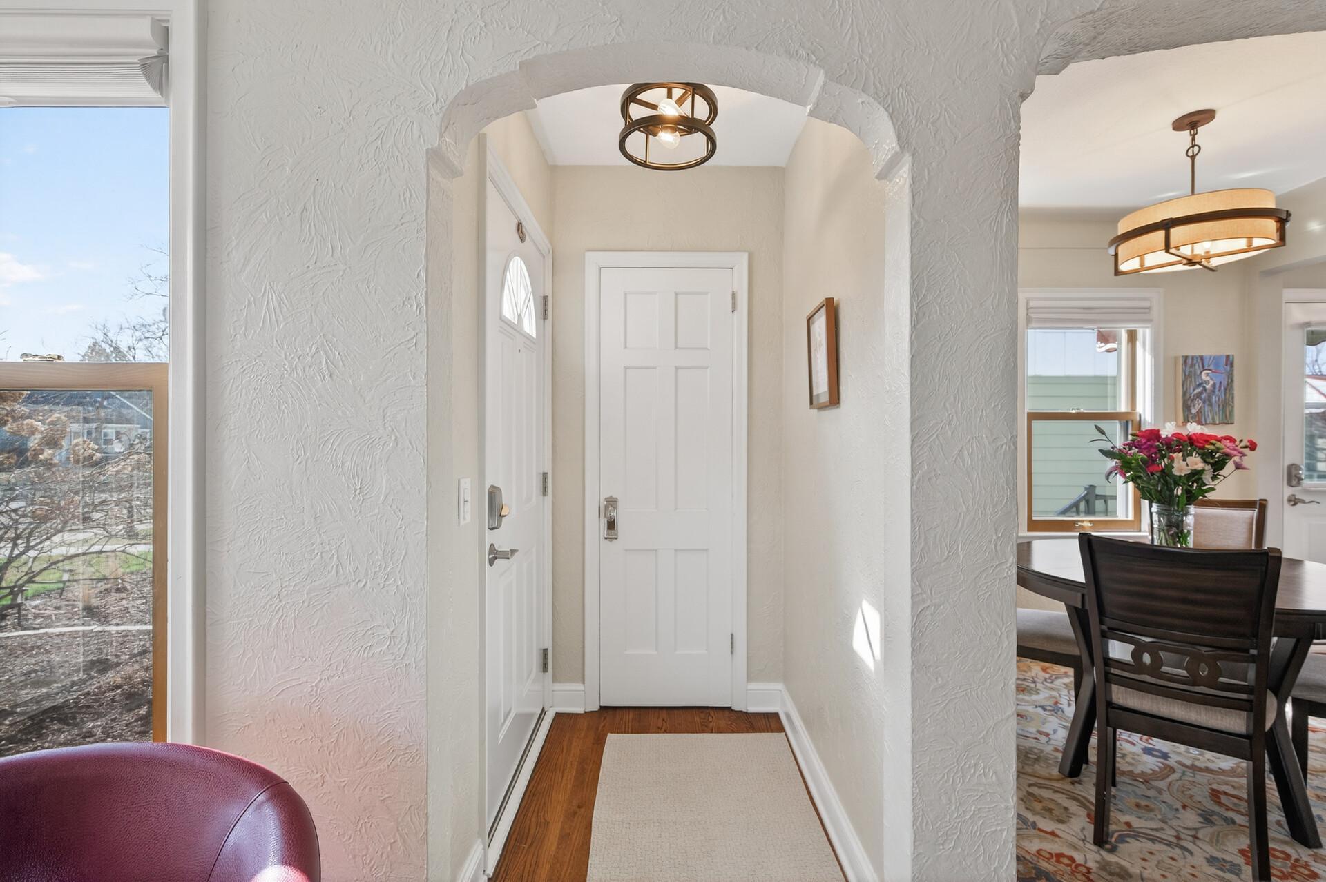 Fresh neutral paint and a convenient coat closet