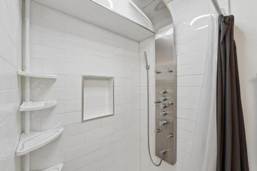 Lower level primary shower that plays music, offers many different settings and lights.