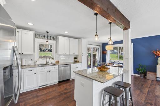 View of the kitchen & island area for additional seating.