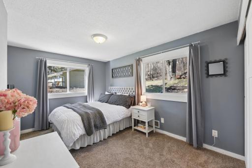 Upper level bedroom 2, nice sized room and 2 windows for natural sunlight.