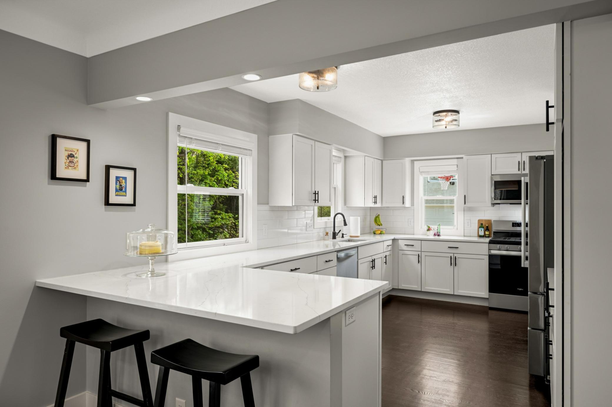 Completely remodeled kitchen with granite countertops.