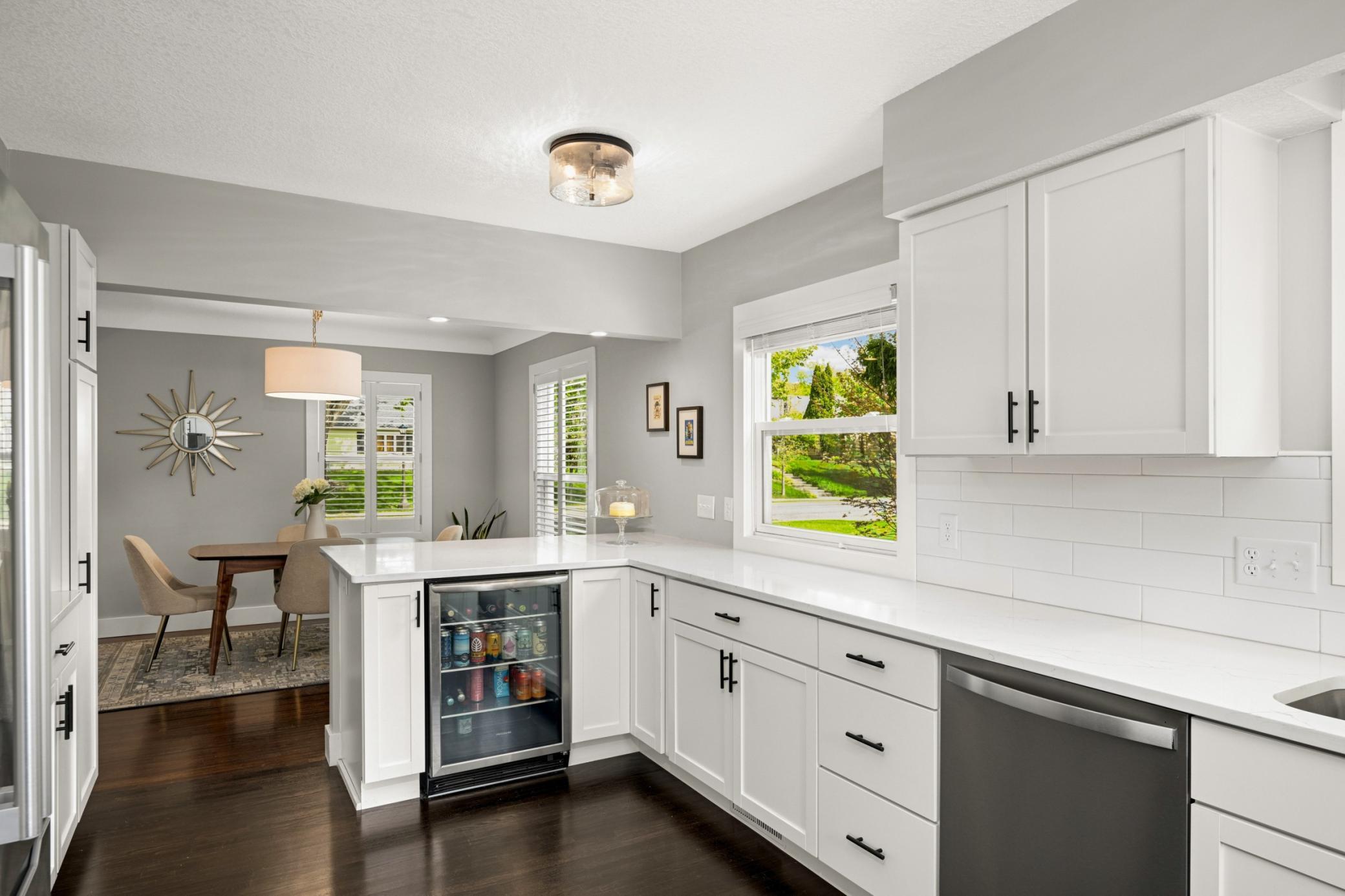 You will love the convenience of this built-in beverage fridge.