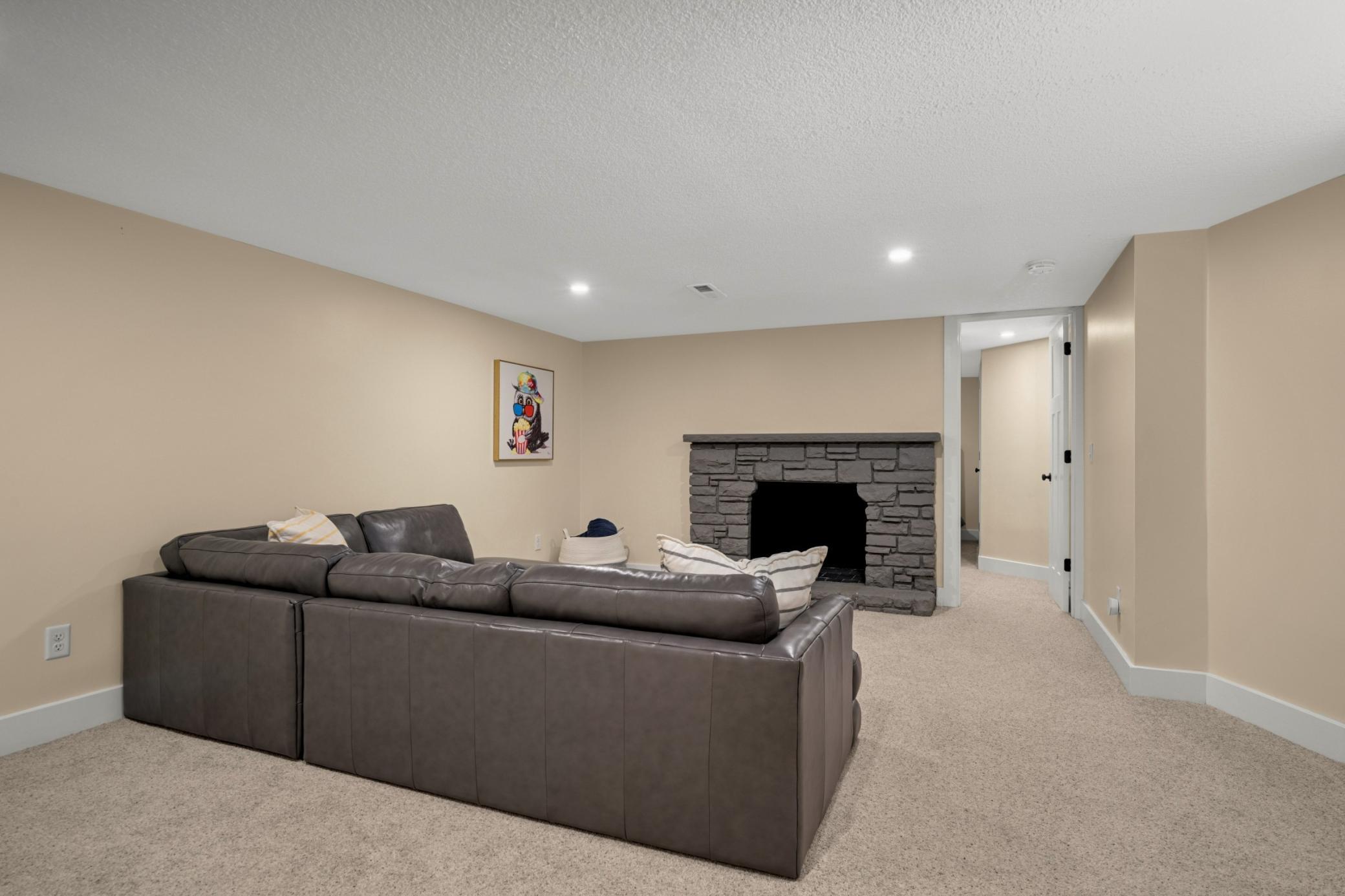 Family room with wood burning fireplace