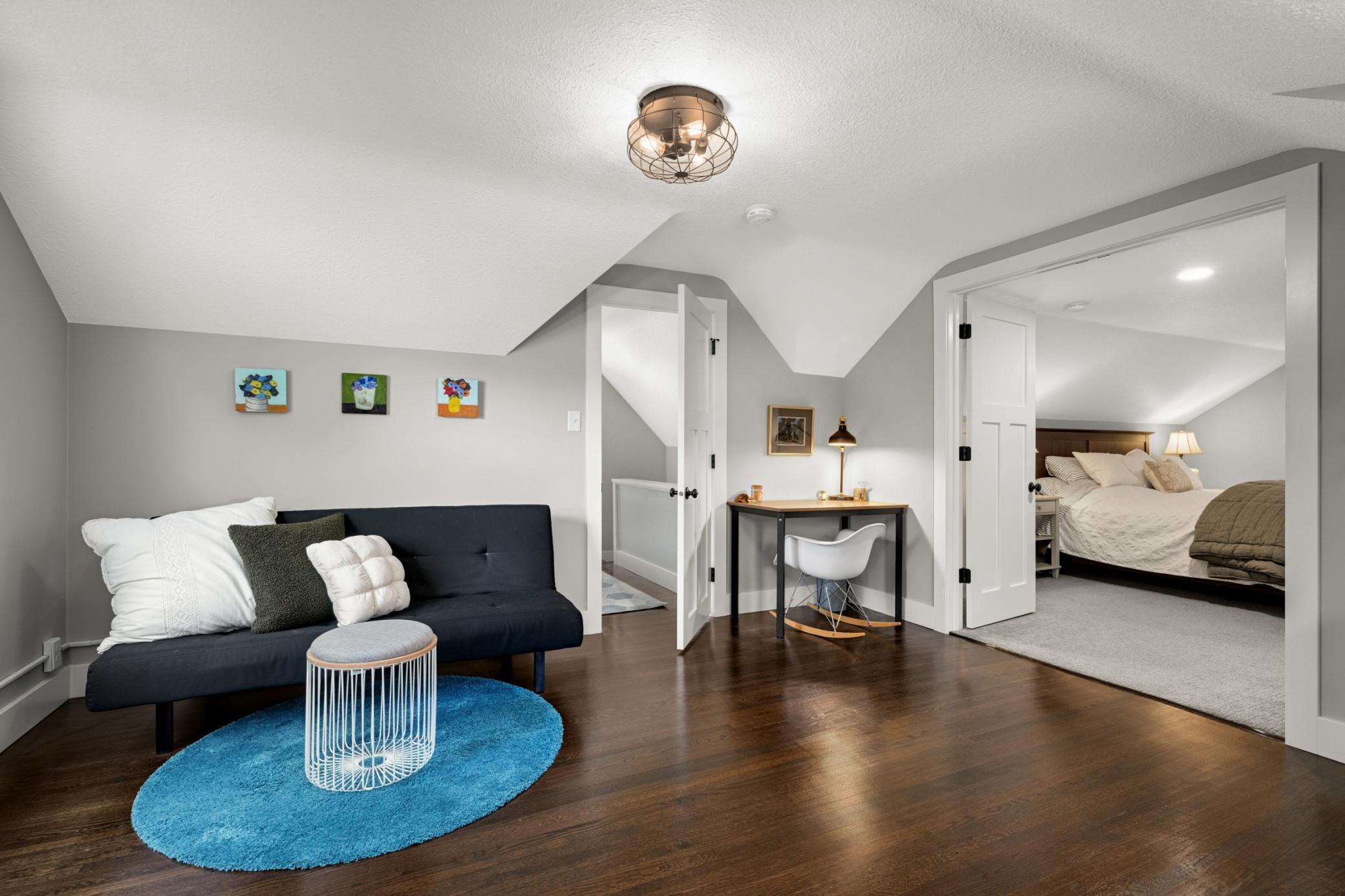 Large sitting room that would work well as a den, office or nursery.