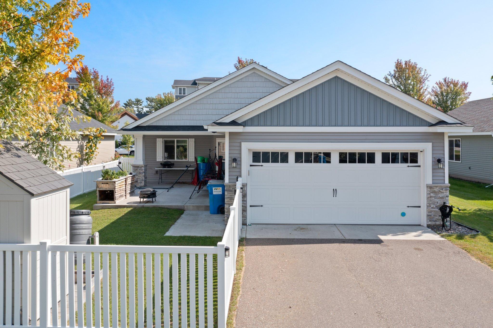 The vinyl fenced backyard and patio area for great outdoor living space.