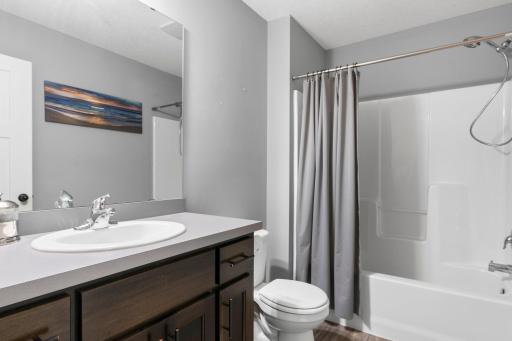 Second bedroom is located between the 2 bedrooms and is a full bathroom