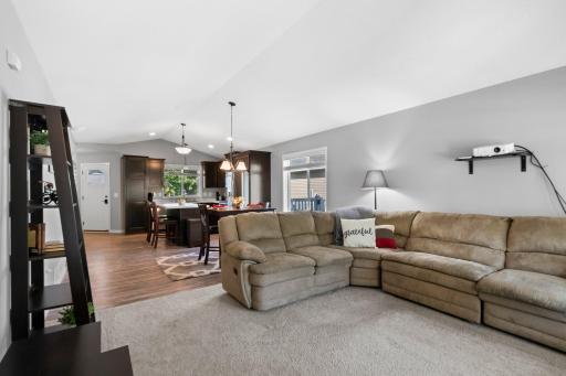 The main living area is open concept with vaulted ceilings