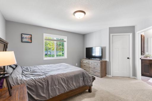 Primary bedroom has large walk-in closet as well as a 3/4 private bath.