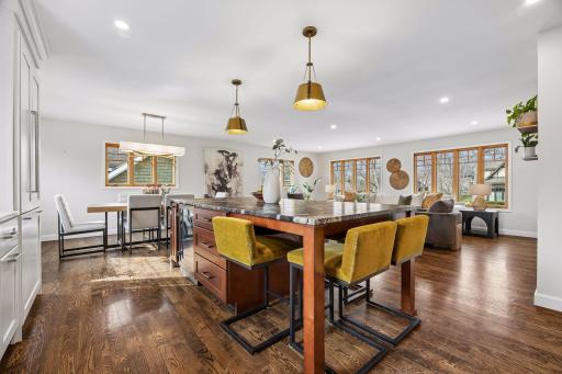 Whether gathering with friends or enjoying a quiet evening, this space feels open, inviting, and effortlessly connected to the heart of the home